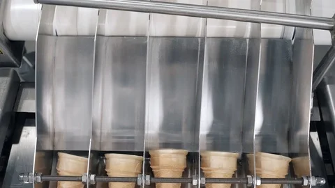 Waffles from first-grade flour move on conveyor equipment Stock Footage 124892499