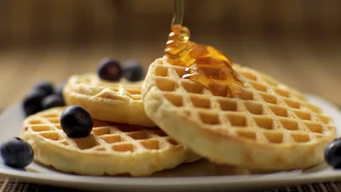 Waffles with honey Stock Footage 257032147