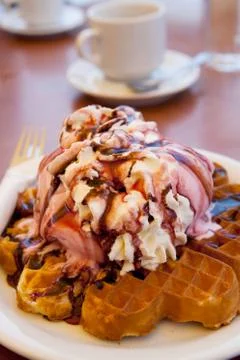 Waffles with ice cream and whipped cream Stock-Fotos