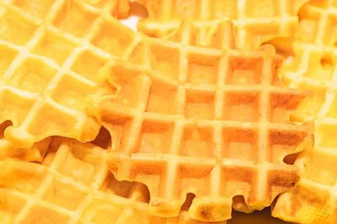 Waffles overlap in appetizing stack Stock Photos