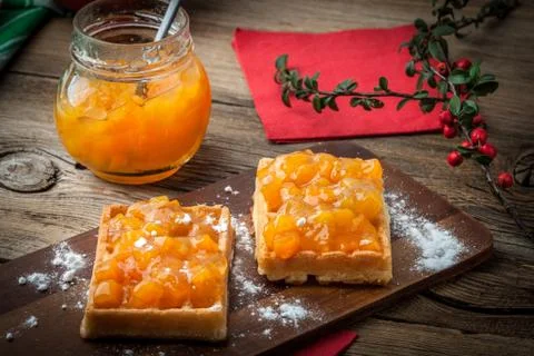 Waffles with peach jam. Stock Photos