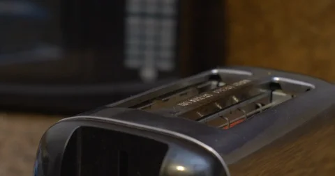 Waffles pop up out of the toaster Stock Footage 127216381