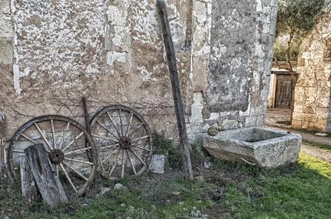 Wagon wheels, in a rural setting. Stock Photos