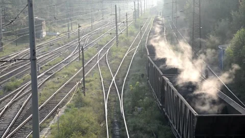 Wagons with coal being transported with train rail in 4k HD 스톡 동영상 334651581