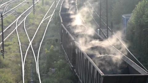 Wagons with coal being transported with train rail in 4k HD Stock-Footage 334651639
