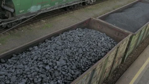 Wagons with coal being transported with train rail in 4k HD 스톡 동영상 334654860