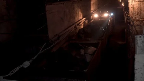 Wagons with ore are turned over in a mine Stock Footage 97161124