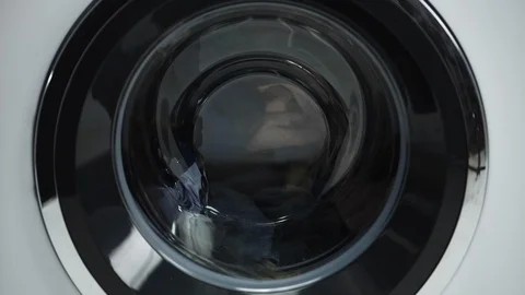 Wahing machine operation from outside Stock Footage 98073048