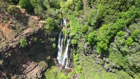 Waipoo Falls Reveal by dramatic drone pullback, Waimea Canyon, Kauai, Hawaii Stock Footage 299965760