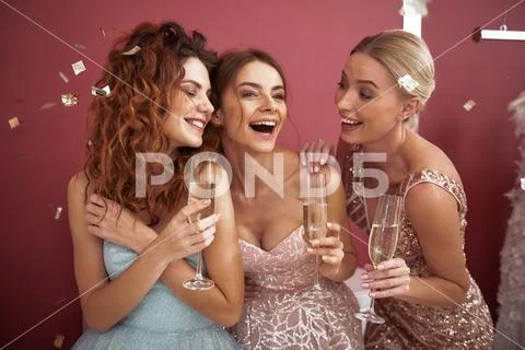 Waist up of happy ladies enjoying girls party Stock Photos