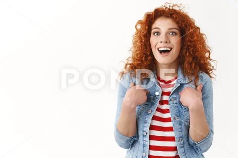 Waist-up surprised impressed redhead stylish feminine ginger girl 25s curly Stock Photos