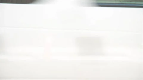 Wait for gap writing caption text street road sign on island in middle of road Stock Footage 252043441