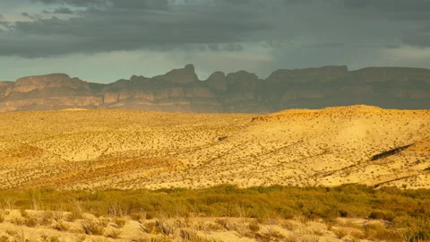 Wait for it! 4K Time lapse of dramatic sunset cloud shadows in Big Bend, Texas Stock Footage 166523816