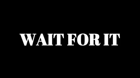 Wait for it text animation on black background Stock Footage 337465344