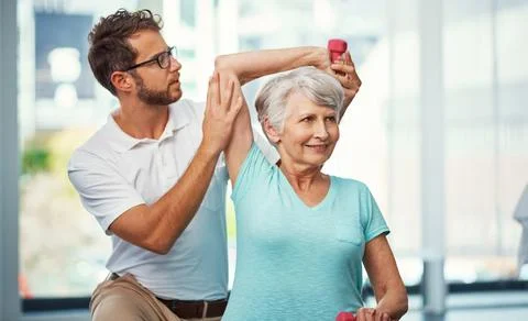 Wait for my count. a senior woman working through her recovery with a male Stock Photos