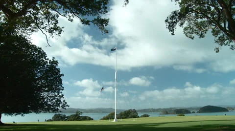 Waitangi flag pole with Piahia in Background Stock Footage 39500110