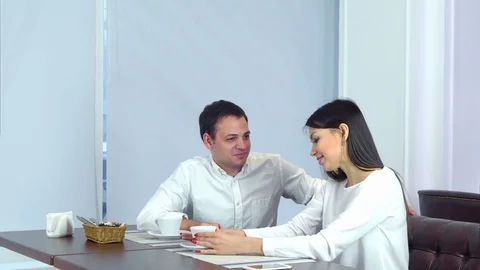 Waiter brining salads while beautiful couple thanking him Stock Footage 72100066
