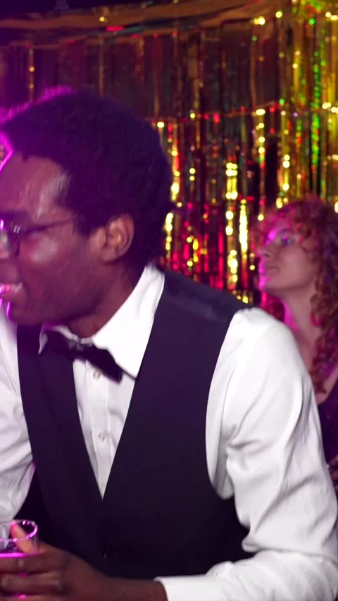 Waiter dancing and having fun at new year's eve party Stock Footage 309853443