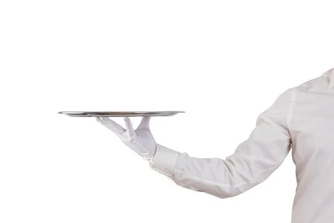 Waiter holding empty silver tray isolated on white background Stock Photos