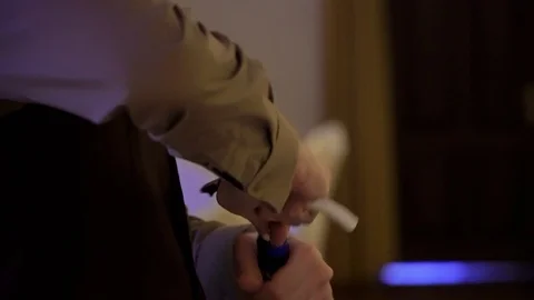 The waiter opens a bottle of wine Stock Footage 98222774