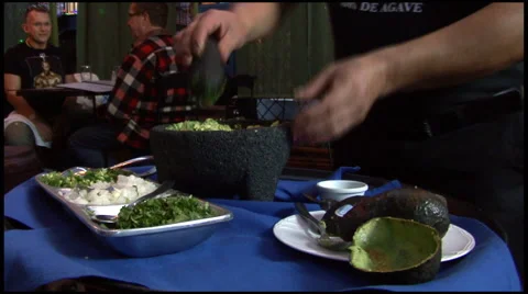 Waiter Perparing Guacamole Stock Footage 62758183