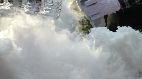 Waiter Pouring Champagne With Liquid Nitrogen Video stock 59663088