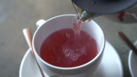 The waiter pours tea. Stock Footage 168516056