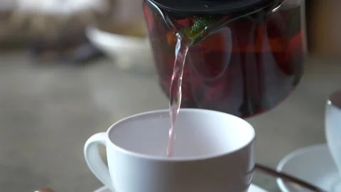 The waiter pours tea. Stock Footage 168516059