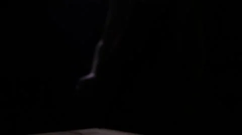 The waiter puts a knife on the table in the dark Stock Footage 61786377