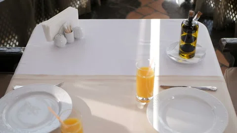 Waiter puts pizza on the table in the restaurant Stock Footage 98929681