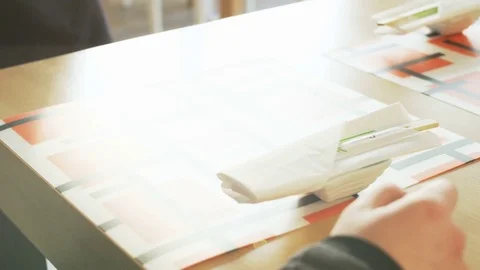 Waiter Puts Plate With Sushi on a Table Stock Footage 71423175