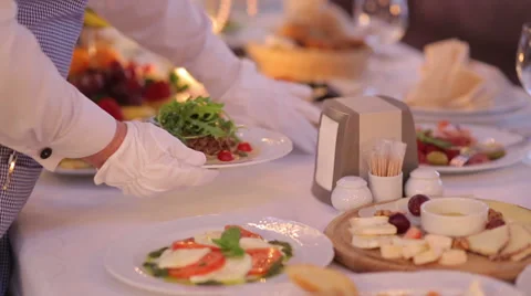 Waiter Serves  Banquet Table Stock Footage 39768299