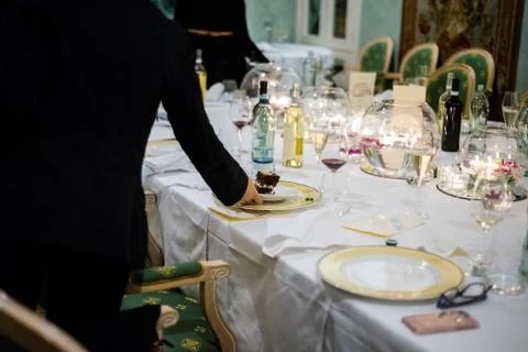 Waiter serves cake Stock Photos
