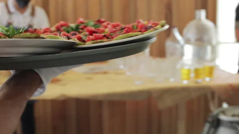 The waiter serves the dish Stock Footage 135150286