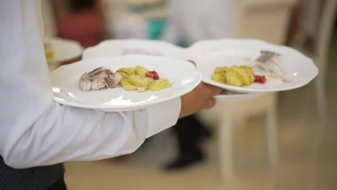 Waiter serves dishes Stock Footage 144748804