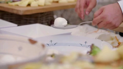The waiter serves the mozzarella Stock Footage 167701588