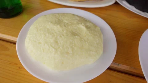 Waiter serving banush on restaurant table Stock Footage 286311358