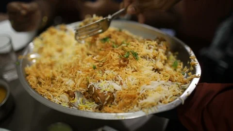 Waiter serving Biryani Stock Footage 86833512