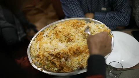 Waiter serving Biryani Stock Footage 86833525