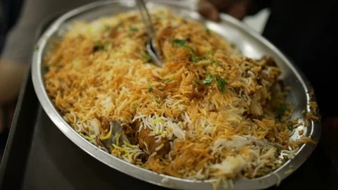 Waiter serving Biryani Stock Footage 86833554