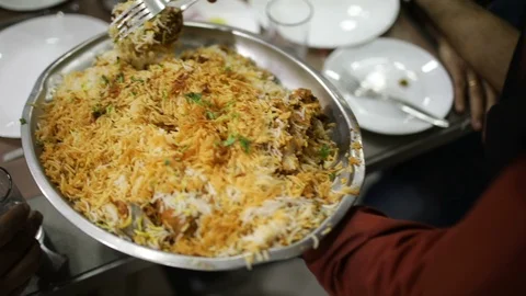 Waiter serving Biryani Stock Footage 86833575