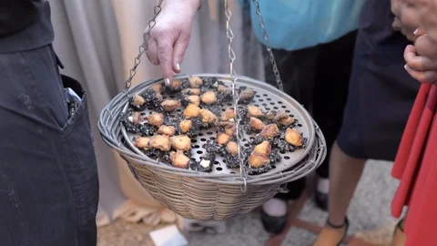 Waiter serving canaps at a banquet Stockbeeldmateriaal 116134364