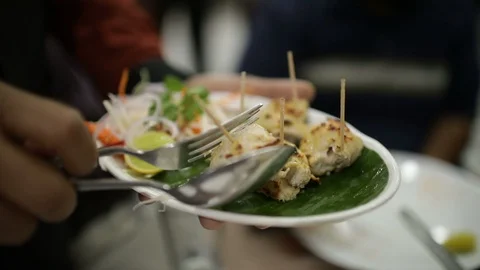 Waiter-serving-Chicken-Tikka Stock Footage 86833290