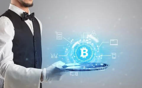 Waiter serving cryptocurrency concept 스톡 사진