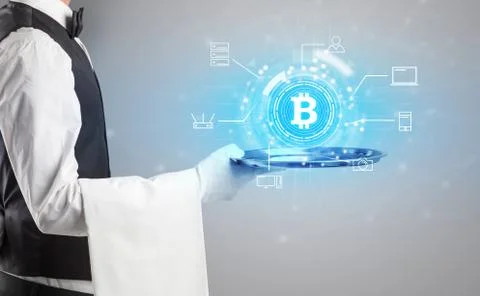Waiter serving cryptocurrency concept Stock Photos