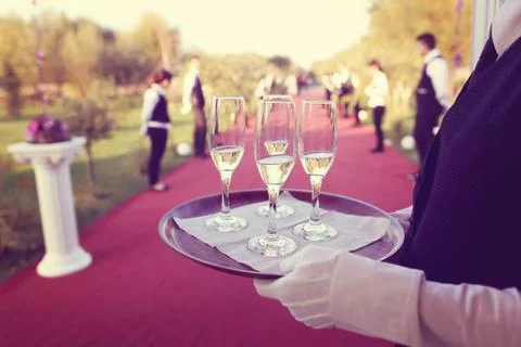 Waiter serving drink Stock Photos