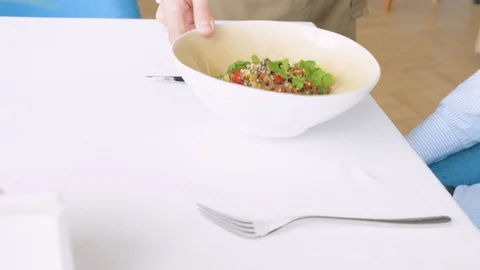 Waiter serving vegetable salad in cafe, closeup Video stock 114876530