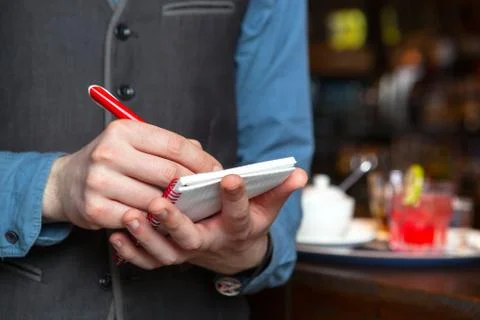 Waiter taking an order. Foto stock