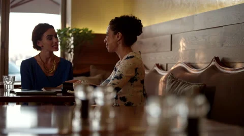 Waiter taking payment using credit card reader at restaurant. Stock Footage 64119272
