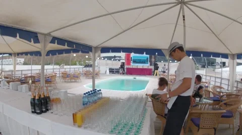The waiters are poured drinks at summer beach restaurant (Time laps) Stock-Footage 55774419